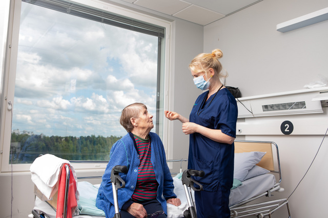 A doctor examining a patient.